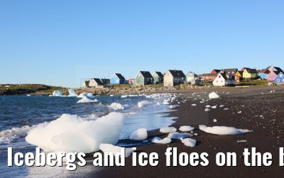 Icebergs and ice floes on the beach in Qeqertarsuaq