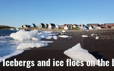 Icebergs and ice floes on the beach in Qeqertarsuaq