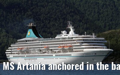 MS Artania anchored in the bay in front of the Svartisen Glacier at 01 July 2013