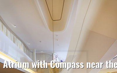Atrium with Compass near the restaurants Celebrity Apex