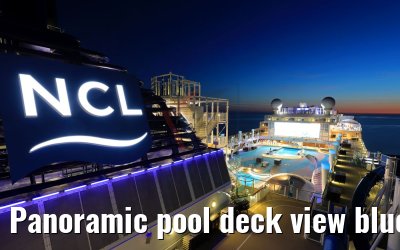 Panoramic pool deck view blue hour Norwegian Bliss