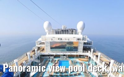 Panoramic view pool deck, waterslides and sun decks Norwegian Bliss