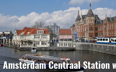 Amsterdam Centraal Station with river boat 03.04.2016 Amsterdam Centraal Station with river boat 03.04.2016