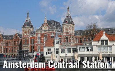 Amsterdam Centraal Station with river boat 03.04.2016 Amsterdam Centraal Station with river boat 03.04.2016