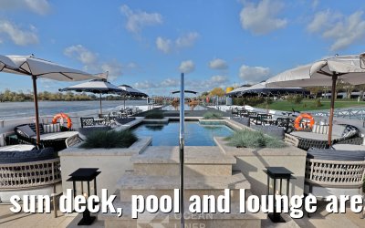 sun deck, pool and lounge area