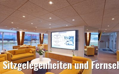 Sitzgelegenheiten und Fernseher Panorama Lounge MS Camargue morgens