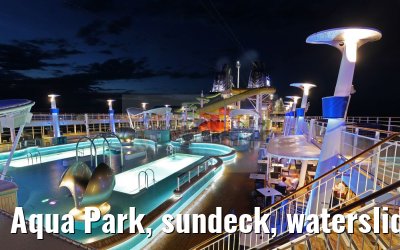 Aqua Park, sundeck, waterslides Norwegian Epic at dusk