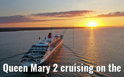Queen Mary 2 cruising on the Elbe river at sunset 21.06.2019
