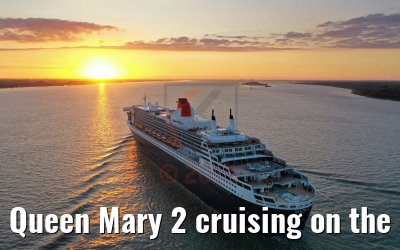 Queen Mary 2 cruising on the Elbe river at sunset 21.06.2019