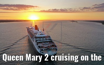 Queen Mary 2 cruising on the Elbe river at sunset 21.06.2019