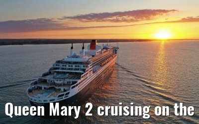 Queen Mary 2 cruising on the Elbe river at sunset 21.06.2019
