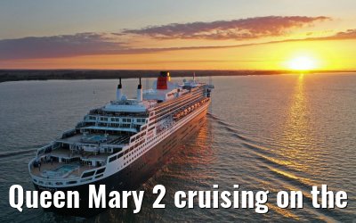 Queen Mary 2 cruising on the Elbe river at sunset 21.06.2019