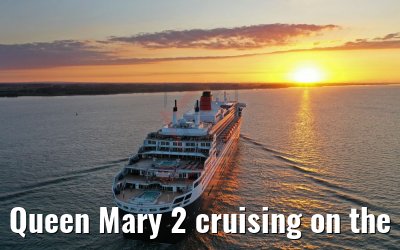 Queen Mary 2 cruising on the Elbe river at sunset 21.06.2019