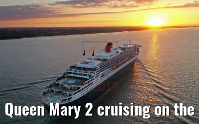 Queen Mary 2 cruising on the Elbe river at sunset 21.06.2019