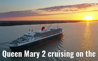 Queen Mary 2 cruising on the Elbe river at sunset 21.06.2019