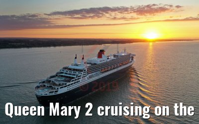 Queen Mary 2 cruising on the Elbe river at sunset 21.06.2019