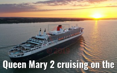 Queen Mary 2 cruising on the Elbe river at sunset 21.06.2019