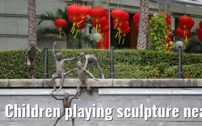 Children playing sculpture near Fullerton Hotel Singapore