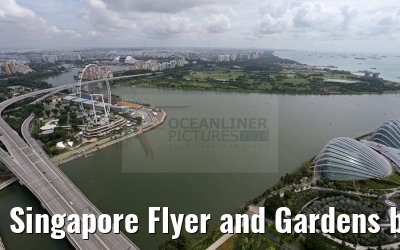 Singapore Flyer and Gardens by the Bay view from Marina Bay Sands Hotel