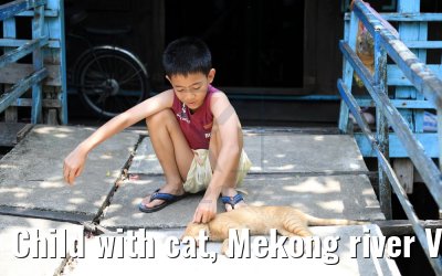 Child with cat, Mekong river Vietnam 10.04.2017